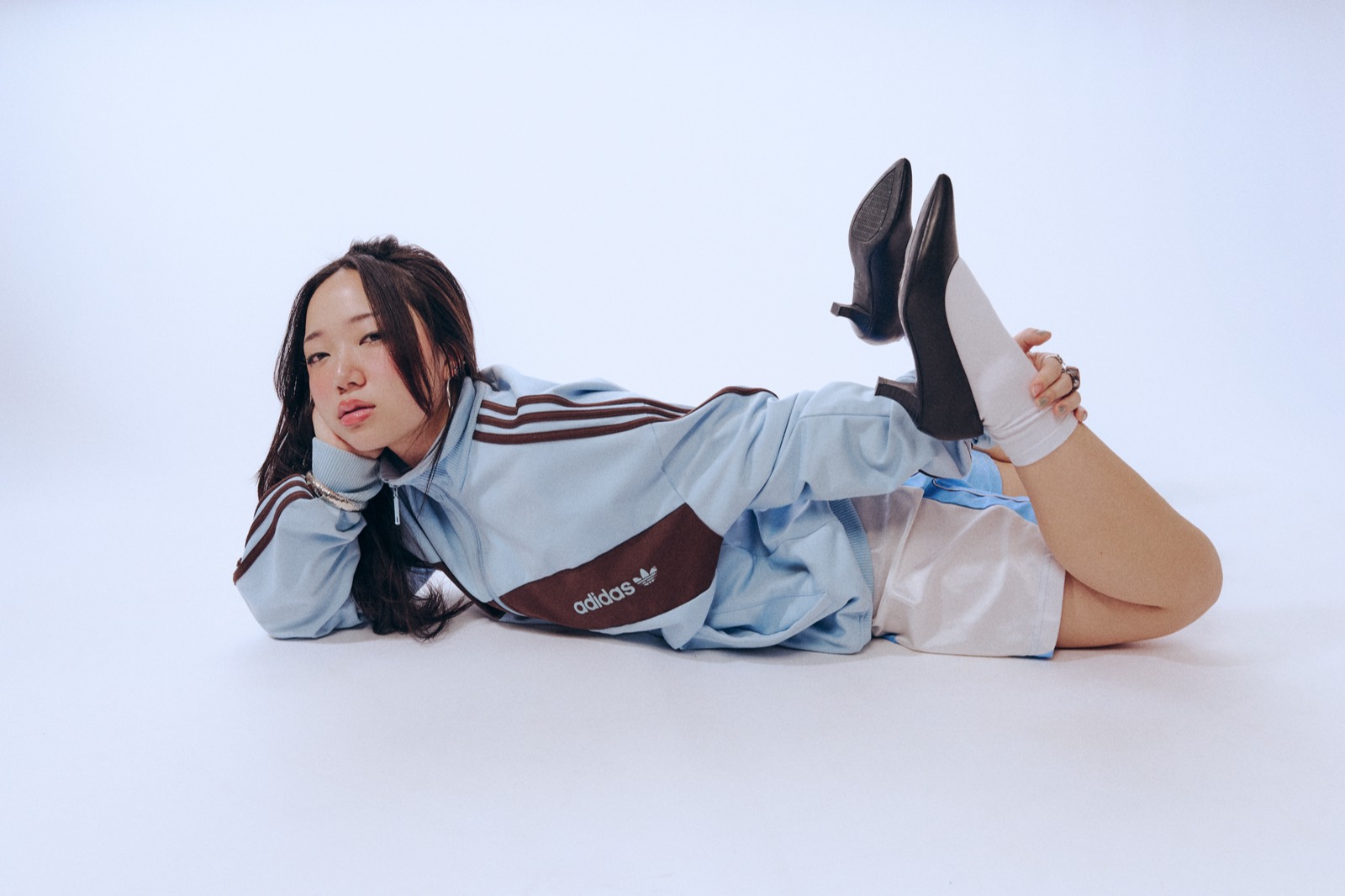 Lying on a studio floor